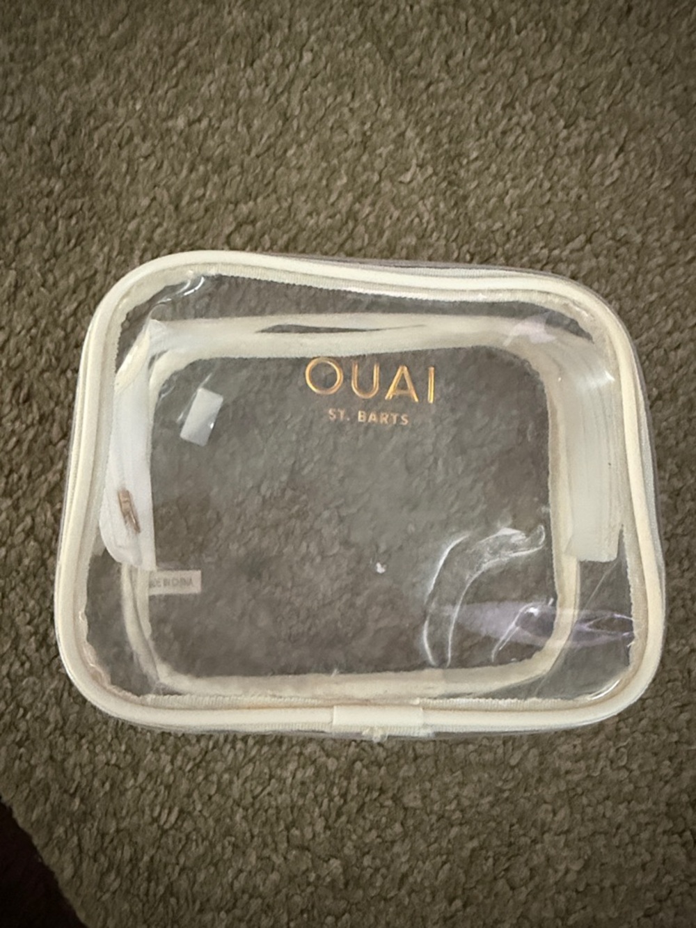 OUAI Clear Cosmetic Pouch with White Trim and Gold Logo